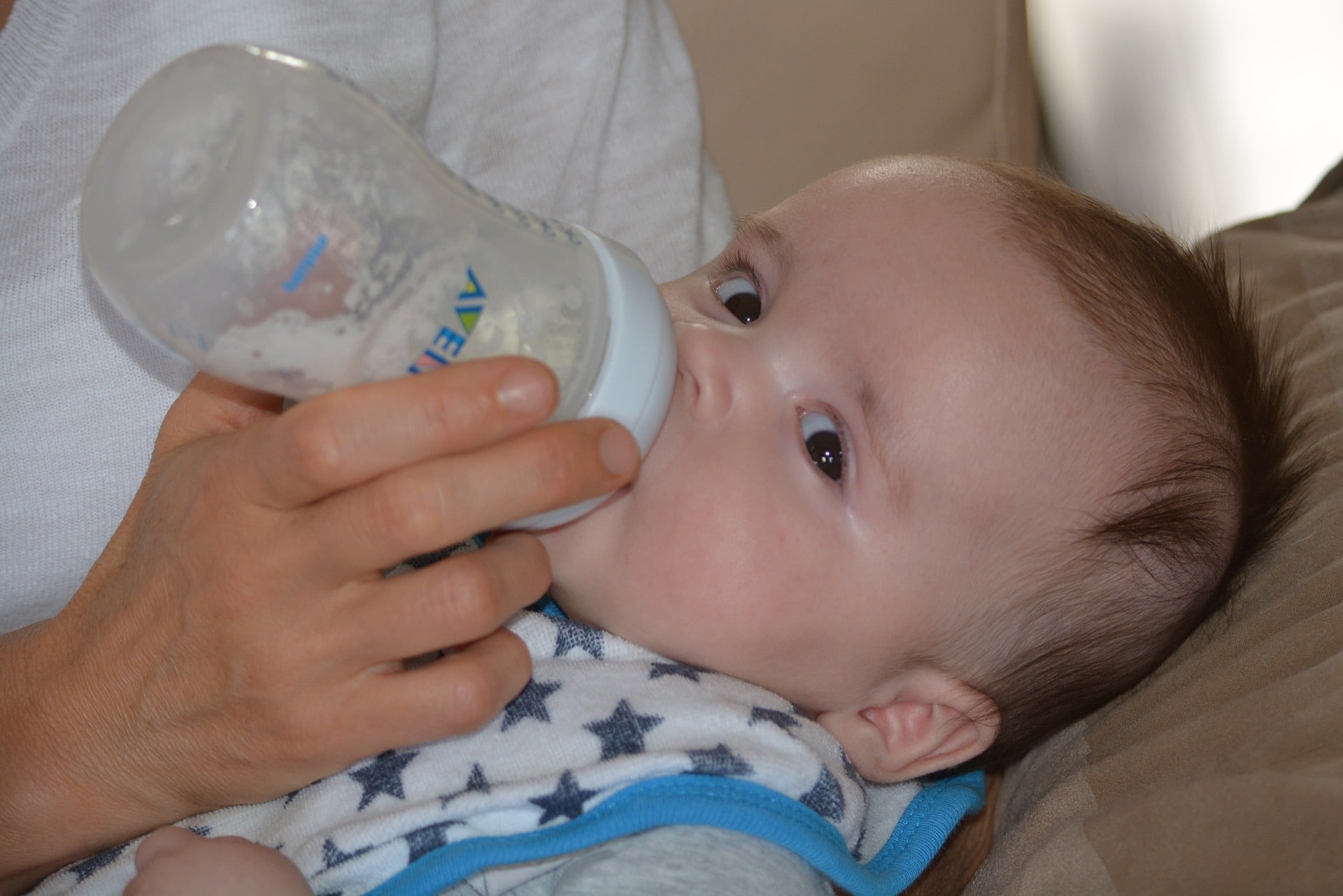 best milk for spit up babies